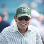 Former New York Jets and Pro Football Hall of Fame quarterback Joe Namath smiles on the field before the start of the NFL football game between the New York Jets and the Miami Dolphins on November 4, 2018 at the Hard Rock Stadium in Miami Gardens, FL.