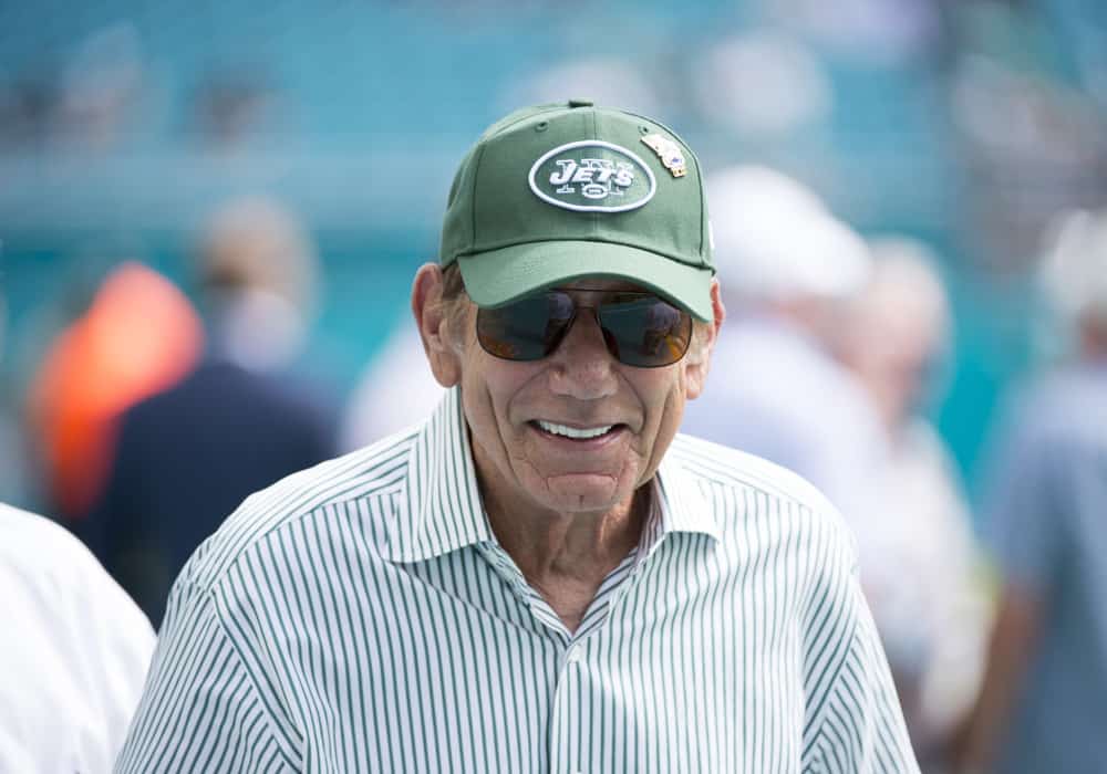 Former New York Jets and Pro Football Hall of Fame quarterback Joe Namath smiles on the field before the start of the NFL football game between the New York Jets and the Miami Dolphins on November 4, 2018 at the Hard Rock Stadium in Miami Gardens, FL.