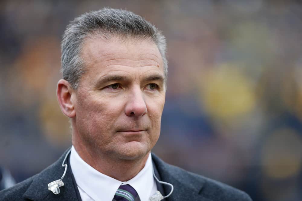 Former Ohio State head coach and current FOX Sports broadcast analyst Urban Meyer is seen on the sideline before the start of a regular season Big 10 Conference game between the Ohio State Buckeyes (2) and the Michigan Wolverines (10) on November 30, 2019 at Michigan Stadium in Ann Arbor, Michigan. 