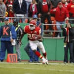 Chiefs running back Jammal Charles runs with the ball after catching a pass. The Buffalo Bills defeated the Kansas City Chiefs 54 to 31 at Arrowhead Stadium in Kansas City, Missouri