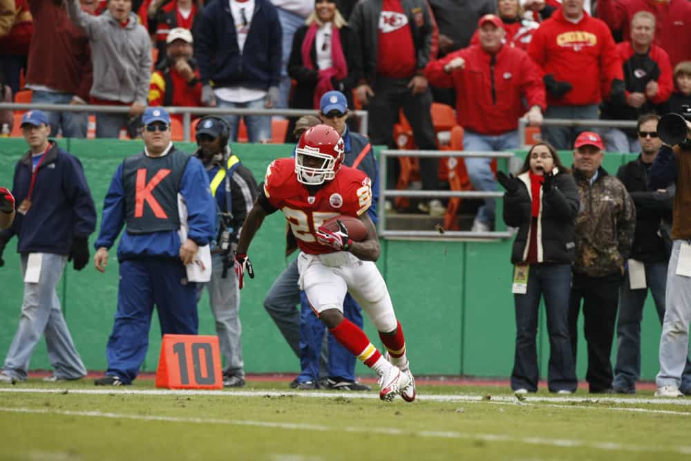 Chiefs running back Jammal Charles runs with the ball after catching a pass. The Buffalo Bills defeated the Kansas City Chiefs 54 to 31 at Arrowhead Stadium in Kansas City, Missouri