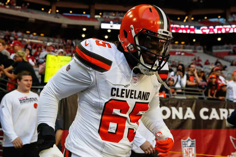 Cleveland Browns defensive tackle Larry Ogunjobi (65) looks on before the NFL football game between the Cleveland Browns and the Arizona Cardinals on December 15, 2019 at State Farm Stadium in Glendale, Arizona.