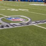 Lucas Oil Stadium with the Wild Card logo painted on the field before a NFL AFC Wild Card football game between the Indianapolis Colts and Cincinnati Bengals at Lucas Oil Stadium in Indianapolis, IN.