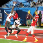 Sean Murphy-Bunting (23) of the Buccaneers tips the ball away from Bryon Pringle (13) of the Chiefs as Antoine Winfield Jr. (31) of the Bucs looks on during the Super Bowl LV game between the Kansas City Chiefs and the Tampa Bay Buccaneers on February 7, 2021 at Raymond James Stadium, in Tampa, FL.