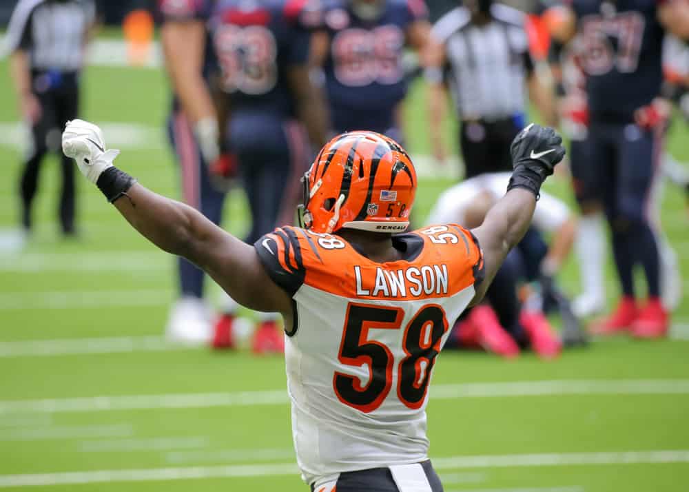 Cincinnati Bengals defensive end Carl Lawson (58) celebrates after recovering a fumble in the fourth quarter of the NFL game between the Cincinnati Bengals and Houston Texans on December 27, 2020 at NRG Stadium in Houston, Texas. 