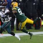 Green Bay Packers inside linebacker Christian Kirksey (58) breaks up a pass intended for Philadelphia Eagles running back Boston Scott (35) during a game between the Green Bay Packers and the Philadelphia Eagles at Lambeau Field on December 6, 2020 in Green Bay WI.