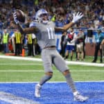 Detroit Lions wide receiver Marvin Jones (11) runs with the ball for a touchdown after catching a pass during a regular season game between the Chicago Bears and the Detroit Lions on November 28, 2019 at Ford Field in Detroit, Michigan.