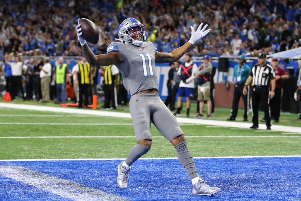 Detroit Lions wide receiver Marvin Jones (11) runs with the ball for a touchdown after catching a pass during a regular season game between the Chicago Bears and the Detroit Lions on November 28, 2019 at Ford Field in Detroit, Michigan. 