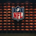 NFL logo with footballs