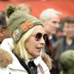 Team owner Dee Haslam of the Cleveland Browns talks with guests on the sidelines while wearing a hat supporting defensive end Myles Garrett #95 prior to the game against the Miami Dolphins at FirstEnergy Stadium on November 24, 2019 in Cleveland, Ohio.