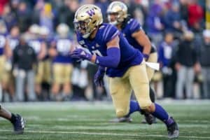 Washington Huskies linebacker Joe Tryon (9) takes off at the snap of the ball during the 112th Apple Cup between the Washington Huskies and the Washington State Cougars on Friday, November 29, 2019 at Husky Stadium in Seattle, WA.