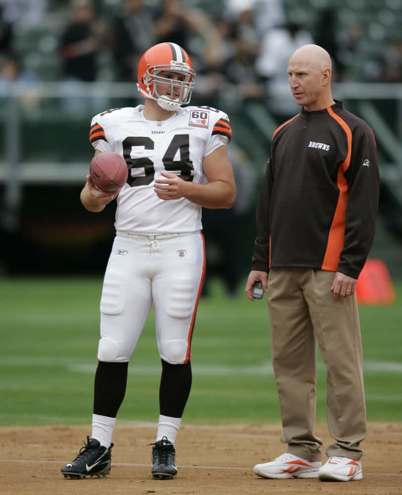 Ryan Pontbriand of the Browns talks with Browns' special team coach Jerry Rosburg before the game against the Raiders at McAfee Coliseum in Oakland, California. Cleveland Browns defeated Oakland Raiders, 24-21.