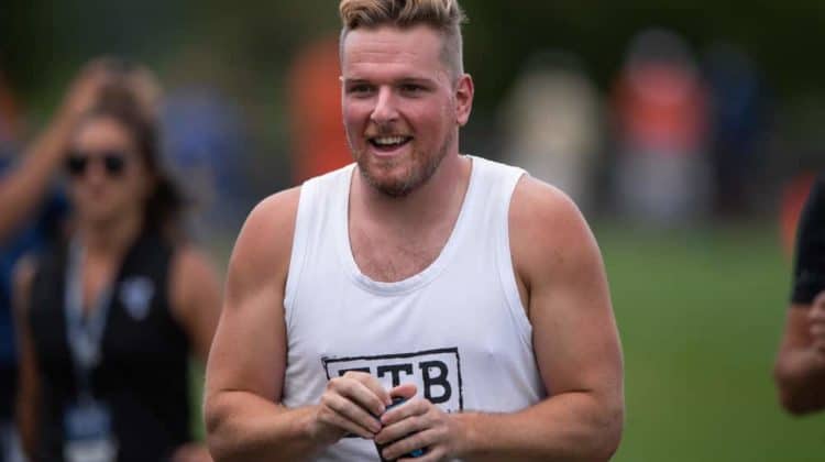 Former Colts punter Pat McAfee watches the Indianapolis Colts and Cleveland Browns joint training camp practice on August 14, 2019 at the Grand Park Sports Campus in Westfield, IN.