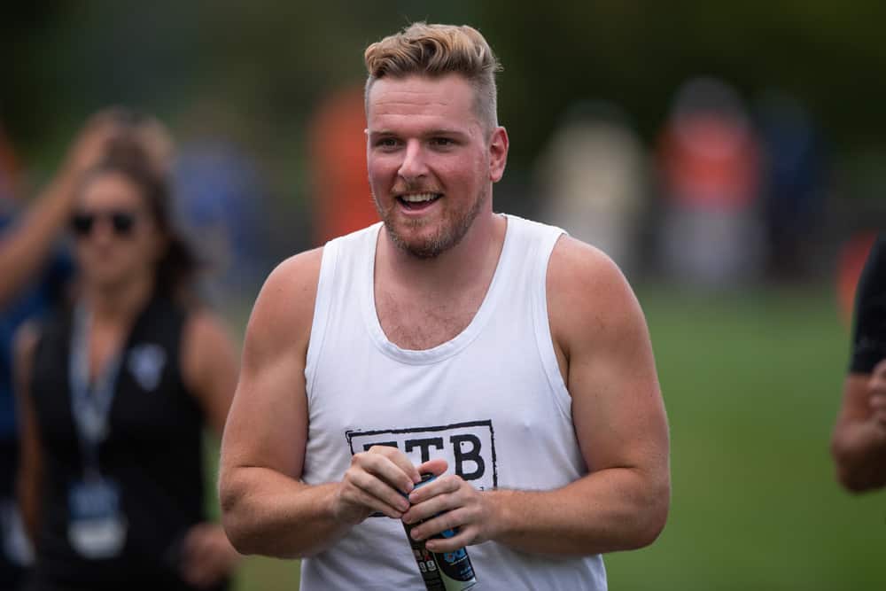 Former Colts punter Pat McAfee watches the Indianapolis Colts and Cleveland Browns joint training camp practice on August 14, 2019 at the Grand Park Sports Campus in Westfield, IN.