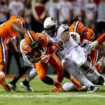 Syracuse Orange running back Abdul Adams (23) is tackled by North Carolina State Wolfpack defensive tackle Alim McNeill (29) during a college football game between the North Carolina State Wolfpack and the Syracuse Orange on October 10, 2019 at Carter-Finlay Stadium in Raleigh, NC.