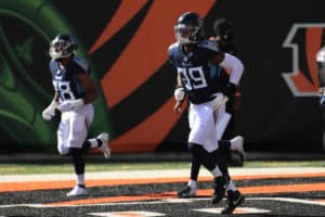 Tennessee Titans outside linebacker Jadeveon Clowney (99) runs onto the field before the game against the Tennessee Titans and the Cincinnati Bengals on November 1, 2020, at Paul Brown Stadium in Cincinnati, OH.