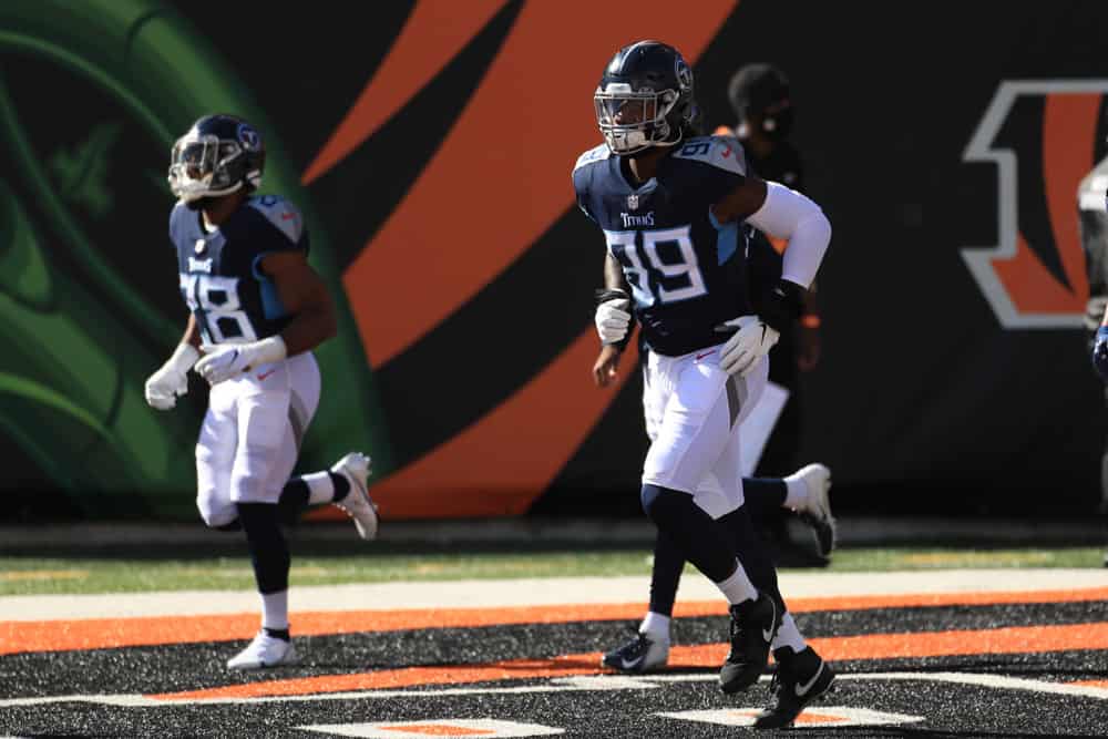 Tennessee Titans outside linebacker Jadeveon Clowney (99) runs onto the field before the game against the Tennessee Titans and the Cincinnati Bengals on November 1, 2020, at Paul Brown Stadium in Cincinnati, OH. 