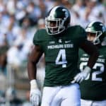 Spartans defensive tackle Malik McDowell (4) catches his breath between plays during a Big Ten Conference NCAA football game between Michigan State and Wisconsin at Spartan Stadium, East Lansing, MI.