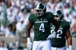 Spartans defensive tackle Malik McDowell (4) catches his breath between plays during a Big Ten Conference NCAA football game between Michigan State and Wisconsin at Spartan Stadium, East Lansing, MI.