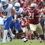 Florida State Seminoles defensive lineman Marvin Wilson (21) pressures Boise State Broncos quarterback Hank Bachmeier (19) during the game between the Boise State Broncos and the Florida State Seminoles on August 31, 2019 at Doak Campbell Stadium in Tallahassee, Fl.