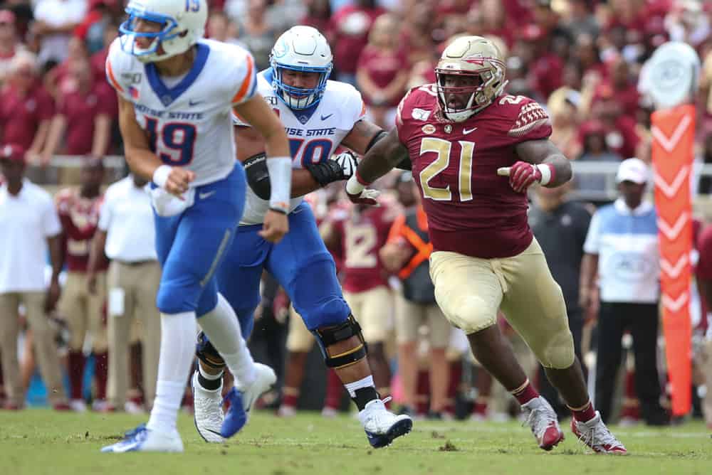 Florida State Seminoles defensive lineman Marvin Wilson (21) pressures Boise State Broncos quarterback Hank Bachmeier (19) during the game between the Boise State Broncos and the Florida State Seminoles on August 31, 2019 at Doak Campbell Stadium in Tallahassee, Fl.