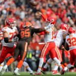 Kansas City Chiefs quarterback Patrick Mahomes (15) is hit by Cleveland Browns defensive end Myles Garrett (95) as he throws a pass during the second quarter of the National Football League game between the Kansas City Chiefs and Cleveland Browns on November 4, 2018, at FirstEnergy Stadium in Cleveland, OH.