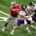 Ohio State Buckeyes defensive tackle Tommy Togiai (72) gets pressure on Northwestern Wildcats quarterback Peyton Ramsey (12) during the Big 10 Championship game between the Northwestern Wildcats and Ohio State Buckeyes on December 19, 2020, at Lucas Oil Stadium in Indianapolis, IN.