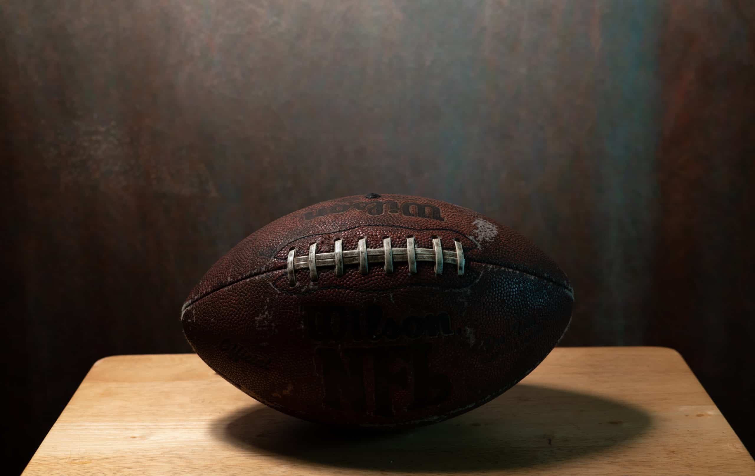 football on wood table