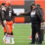 Quarterback Baker Mayfield #6 of the Cleveland Browns is greeted by offensive coordinator Alex Van Pelt as he walks off the field during the first half of the NFL game against the Las Vegas Raiders at FirstEnergy Stadium on November 01, 2020 in Cleveland, Ohio.