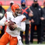 Quarterback Baker Mayfield #6 of the Cleveland Browns drops back to pass against the defense of the Kansas City Chiefs during the AFC Divisional Playoff game at Arrowhead Stadium on January 17, 2021 in Kansas City, Missouri.