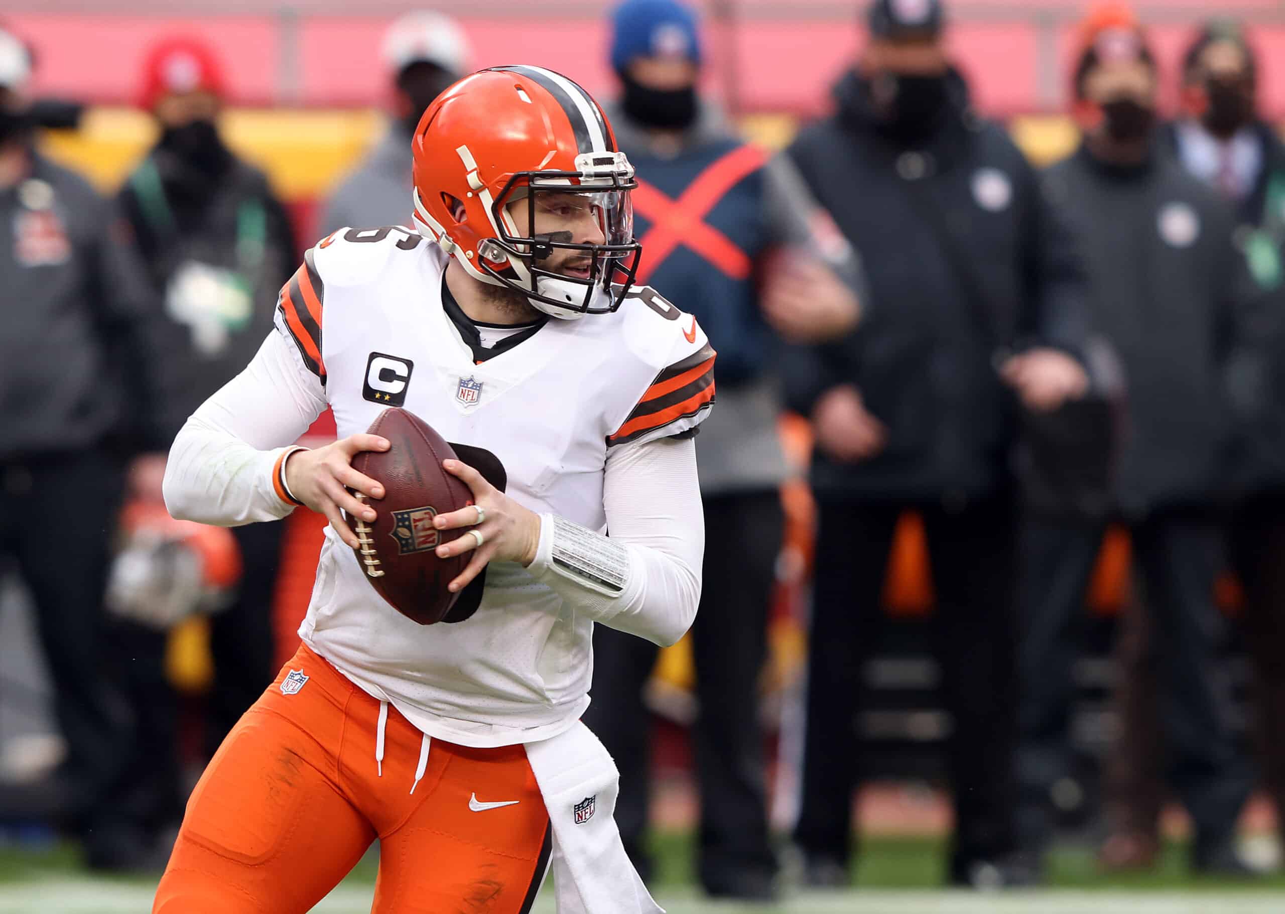 Quarterback Baker Mayfield #6 of the Cleveland Browns drops back to pass against the defense of the Kansas City Chiefs during the AFC Divisional Playoff game at Arrowhead Stadium on January 17, 2021 in Kansas City, Missouri. 