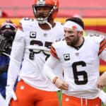 JANUARY 17: Quarterback Baker Mayfield #6 of the Cleveland Browns and defensive end Myles Garrett #95 warm up prior to the AFC Divisional Playoff game against the Kansas City Chiefs at Arrowhead Stadium on January 17, 2021 in Kansas City, Missouri.