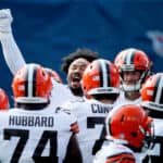 Myles Garrett #95of the Cleveland Browns huddles with his teammates after warmups prior to their game against the Tennessee Titans at Nissan Stadium on December 06, 2020 in Nashville, Tennessee.
