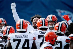 Myles Garrett #95of the Cleveland Browns huddles with his teammates after warmups prior to their game against the Tennessee Titans at Nissan Stadium on December 06, 2020 in Nashville, Tennessee.