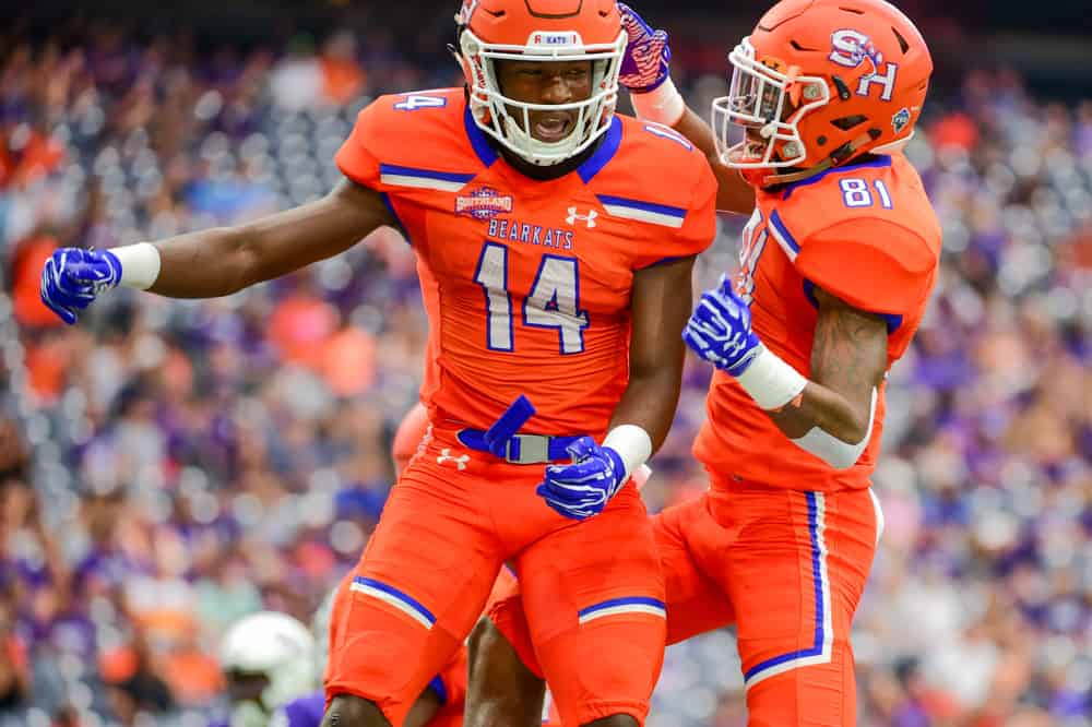 Sam Houston State Bearkats wide receiver Davion Davis (14) and Sam Houston State Bearkats wide receiver Nathan Stewart (81) celebrate a Davis first half touchdown during the Battle of the Piney Woods football game between Stephen F. Austin Lumberjacks and the Sam Houston State Bearkats on October 7, 2017 at NRG Stadium in Houston, Texas.