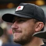 Johnny Manziel watches play between the Texas A&M Aggies and the Arkansas Razorbacks during the Southwest Classic at AT&T Stadium on September 28, 2019 in Arlington, Texas.
