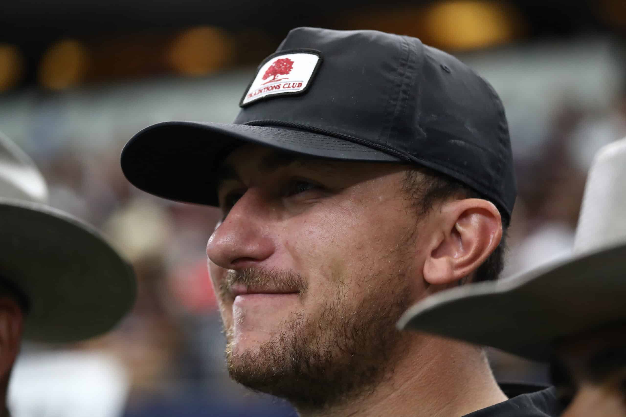 Johnny Manziel watches play between the Texas A&M Aggies and the Arkansas Razorbacks during the Southwest Classic at AT&T Stadium on September 28, 2019 in Arlington, Texas.