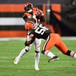 Giovani Bernard #25 of the Cincinnati Bengals is tackled by Malcolm Smith #56 of the Cleveland Browns after a pass reception in the fourth quarter at FirstEnergy Stadium on September 17, 2020 in Cleveland, Ohio. Cleveland defeated Cincinnati 35-30.