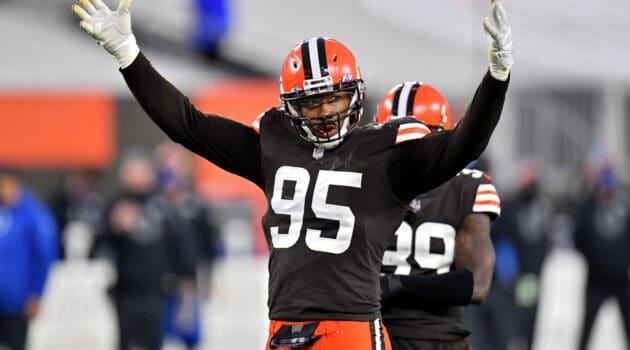 Myles Garrett #95 of the Cleveland Browns pumps up the crowd in the fourth quarter against the Indianapolis Colts at FirstEnergy Stadium on October 11, 2020 in Cleveland, Ohio.