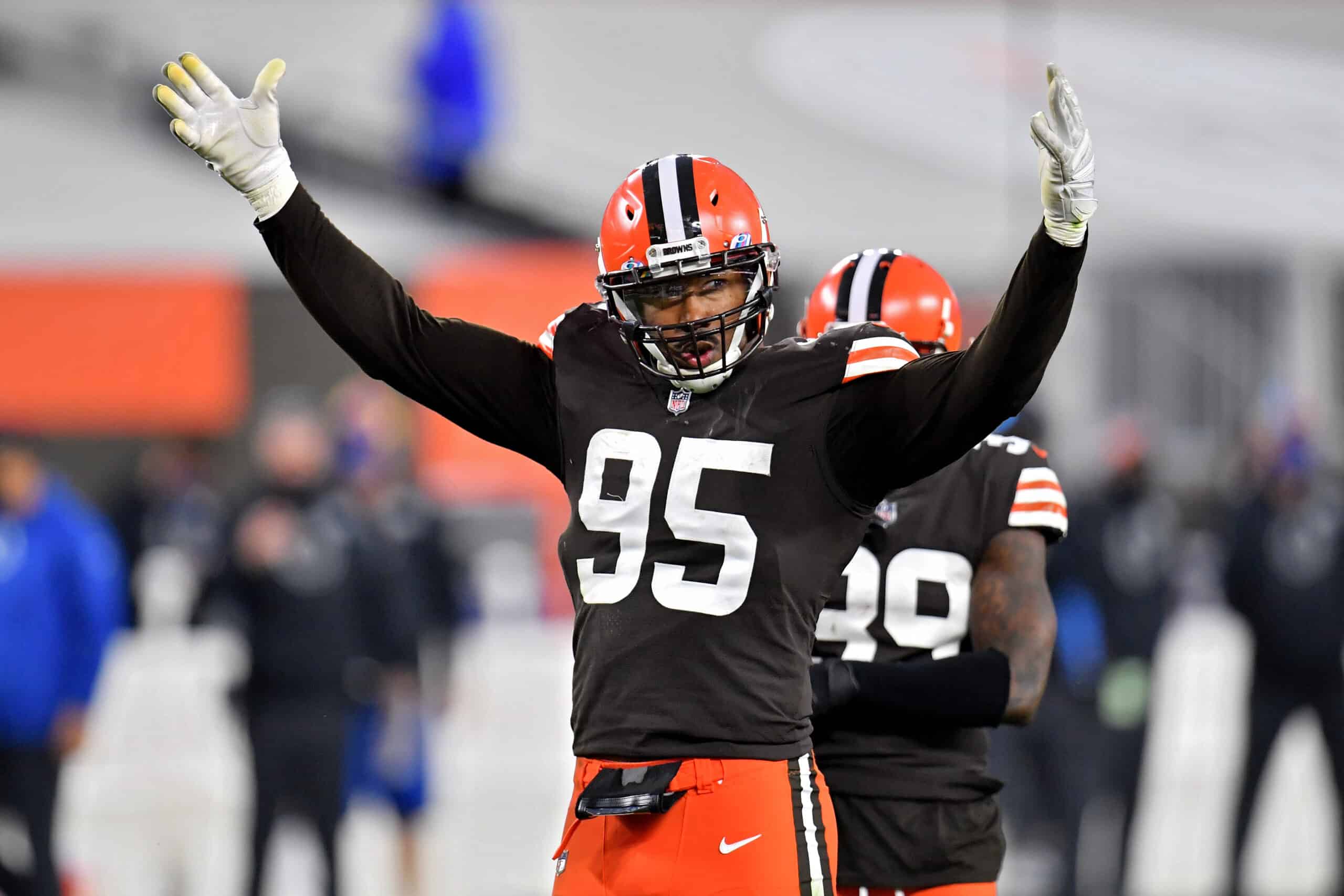 Myles Garrett #95 of the Cleveland Browns pumps up the crowd in the fourth quarter against the Indianapolis Colts at FirstEnergy Stadium on October 11, 2020 in Cleveland, Ohio. 