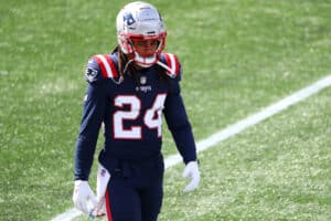 Stephon Gilmore #24 of the New England Patriots looks on before the game against the Denver Broncos at Gillette Stadium on October 18, 2020 in Foxborough, Massachusetts.