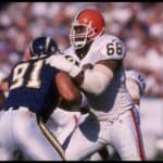 Tackle Tony Jones #66 of the Cleveland Browns tries to keep defensive end Leslie O'Neal #91 of the San Diego Chargers far away from his quarterback at Jack Murphy Stadium in San Diego, California. The Chargers defeated the Browns 31-13. Man