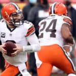 Quarterback Baker Mayfield #6 of the Cleveland Browns drops back to pass against the defense of the Kansas City Chiefs during the AFC Divisional Playoff game at Arrowhead Stadium on January 17, 2021 in Kansas City, Missouri.