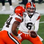 Baker Mayfield #6 of the Cleveland Browns attempts a handoff to Nick Chubb #24 during the first half of the AFC Wild Card Playoff game against the Pittsburgh Steelers at Heinz Field on January 10, 2021 in Pittsburgh, Pennsylvania.