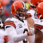 Quarterback Baker Mayfield #6 of the Cleveland Browns and teammates warm up prior to the AFC Divisional Playoff game against the Kansas City Chiefs at Arrowhead Stadium on January 17, 2021 in Kansas City, Missouri.