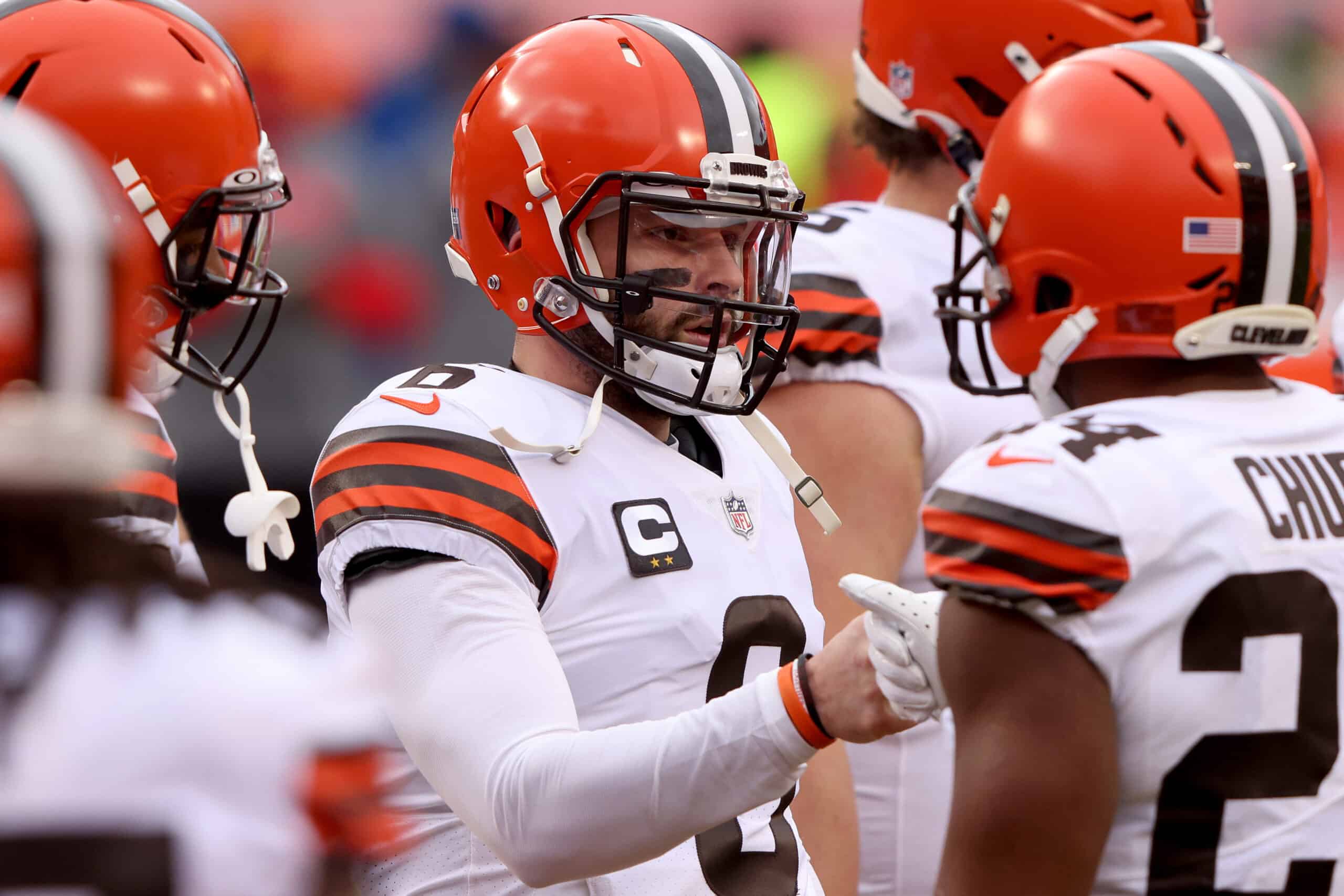 Quarterback Baker Mayfield #6 of the Cleveland Browns and teammates warm up prior to the AFC Divisional Playoff game against the Kansas City Chiefs at Arrowhead Stadium on January 17, 2021 in Kansas City, Missouri.