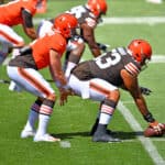Quarterback Baker Mayfield #6 takes the snap from center Nick Harris #53 of the Cleveland Browns during training camp at FirstEnergy Stadium on August 30, 2020 in Cleveland, Ohio.