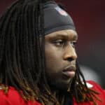Takkarist McKinley #98 of the Atlanta Falcons watches on in the second half on an NFL game against the Carolina Panthers at Mercedes-Benz Stadium on December 8, 2019 in Atlanta, Georgia.