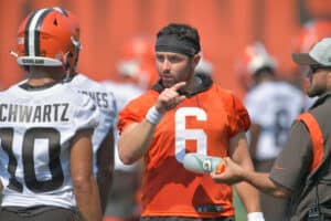 Quarterback Baker Mayfield #6 talks to wide receiver Anthony Schwartz #10 of the Cleveland Browns during the first day of Cleveland Browns Training Camp on July 28, 2021 in Berea, Ohio.