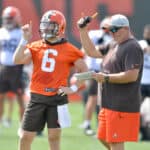 Quarterback Baker Mayfield #6 talks with offensive coordinator Alex Van Pelt during Cleveland Browns Training Camp on July 30, 2021 in Berea, Ohio.
